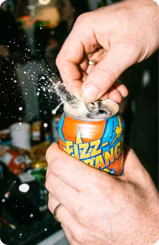 AI-generated image of hands opening a Fizz Bang soda can