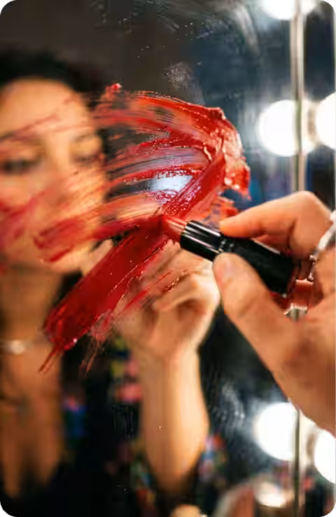 AI-generated woman with red paint on face