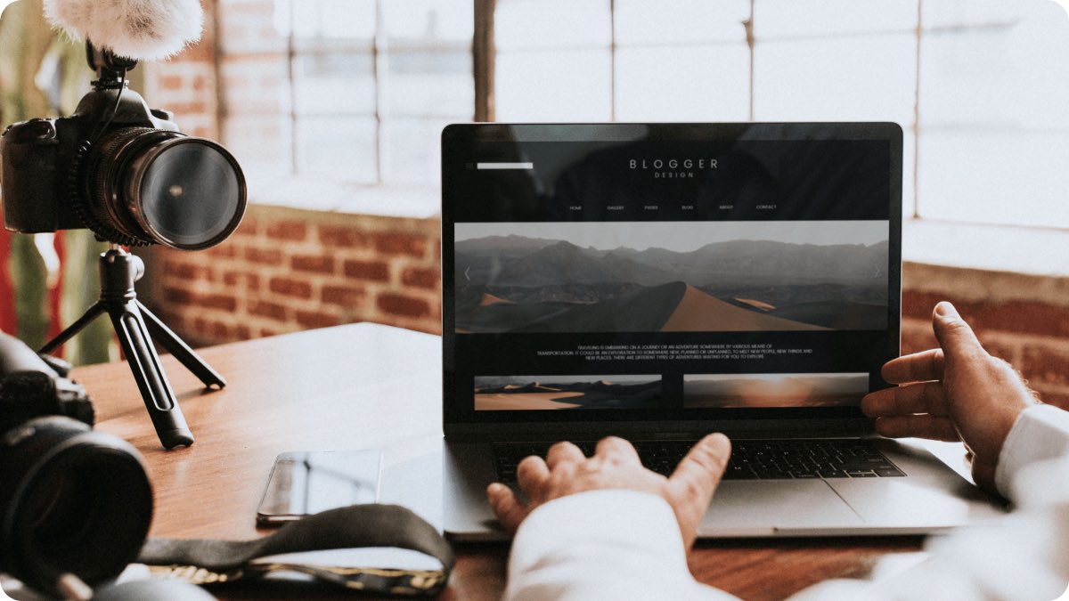 Video creator editing footage on laptop