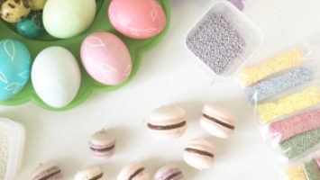 Easter-themed stock photo with painted eggs and sweet biscuits